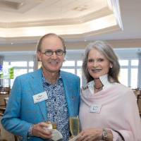 Dan Terpsma and Jessica Murphy standing together and smiling for camera
